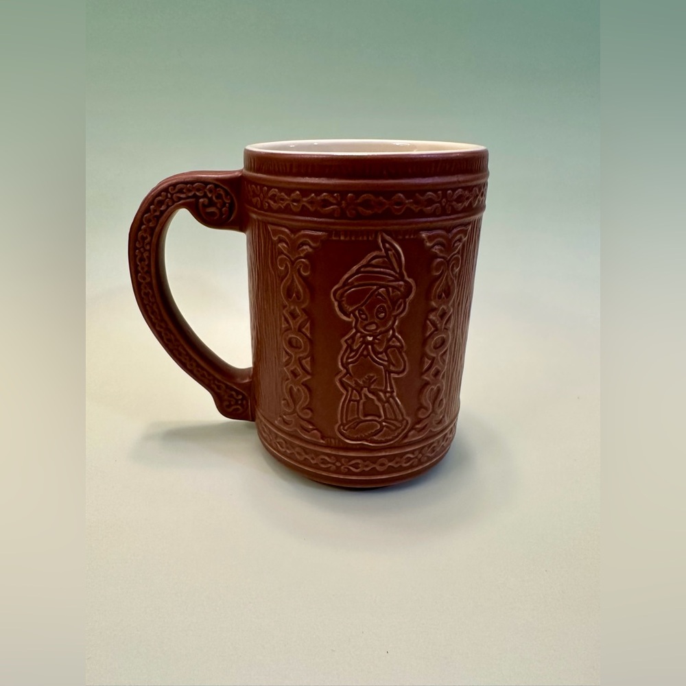 Disney’s Pinochio brown embossed coffee mug